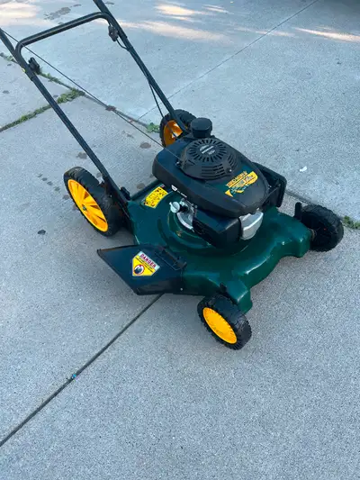 Selling a Honda lawnmower auto choke start on first pull, wheels adjustable, side discharge. It work...