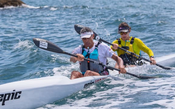 Nathan Fa'avae (left) and Sophie Hart (right) kayaking.