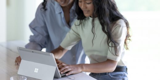 Mother and daughter using a Surface Go 3