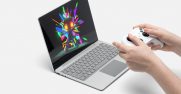 Person gaming on Surface Laptop Go 2 in Platinum