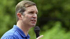 FILE- Kentucky Gov. Andy Beshear speaks at the Wayland Volunteer Fire Station in Wayland, Ky., July 26, 2024. (AP Photo/Timothy D. Easley, File)