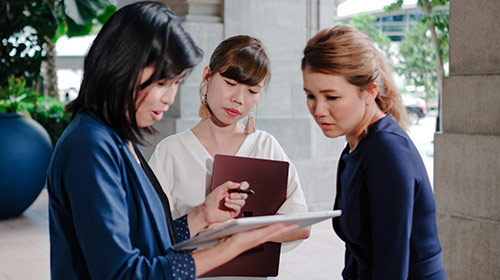 Three woman are working