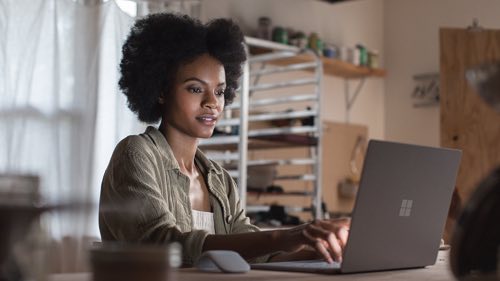 Person working on a laptop at home