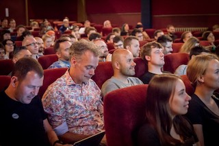 Rows of people in the comfy seats of the Duke of York’s cinema.