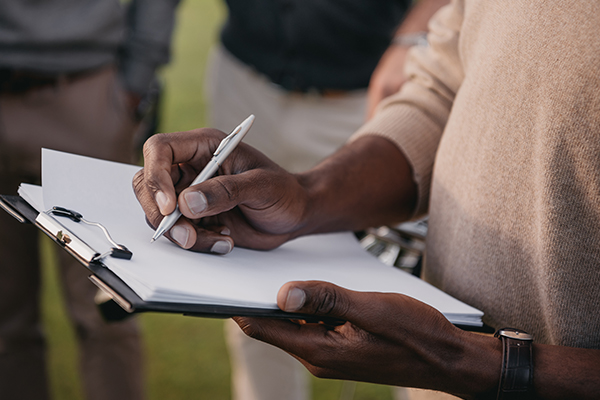 Person holding clipboard