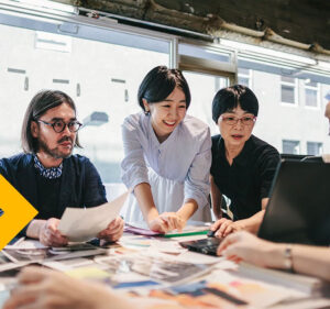 Coworkers reviewing photographs