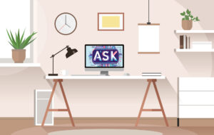 An illustration of a desk in an office. The laptop is open on the desk and the words ASK are shown on the laptop screen.