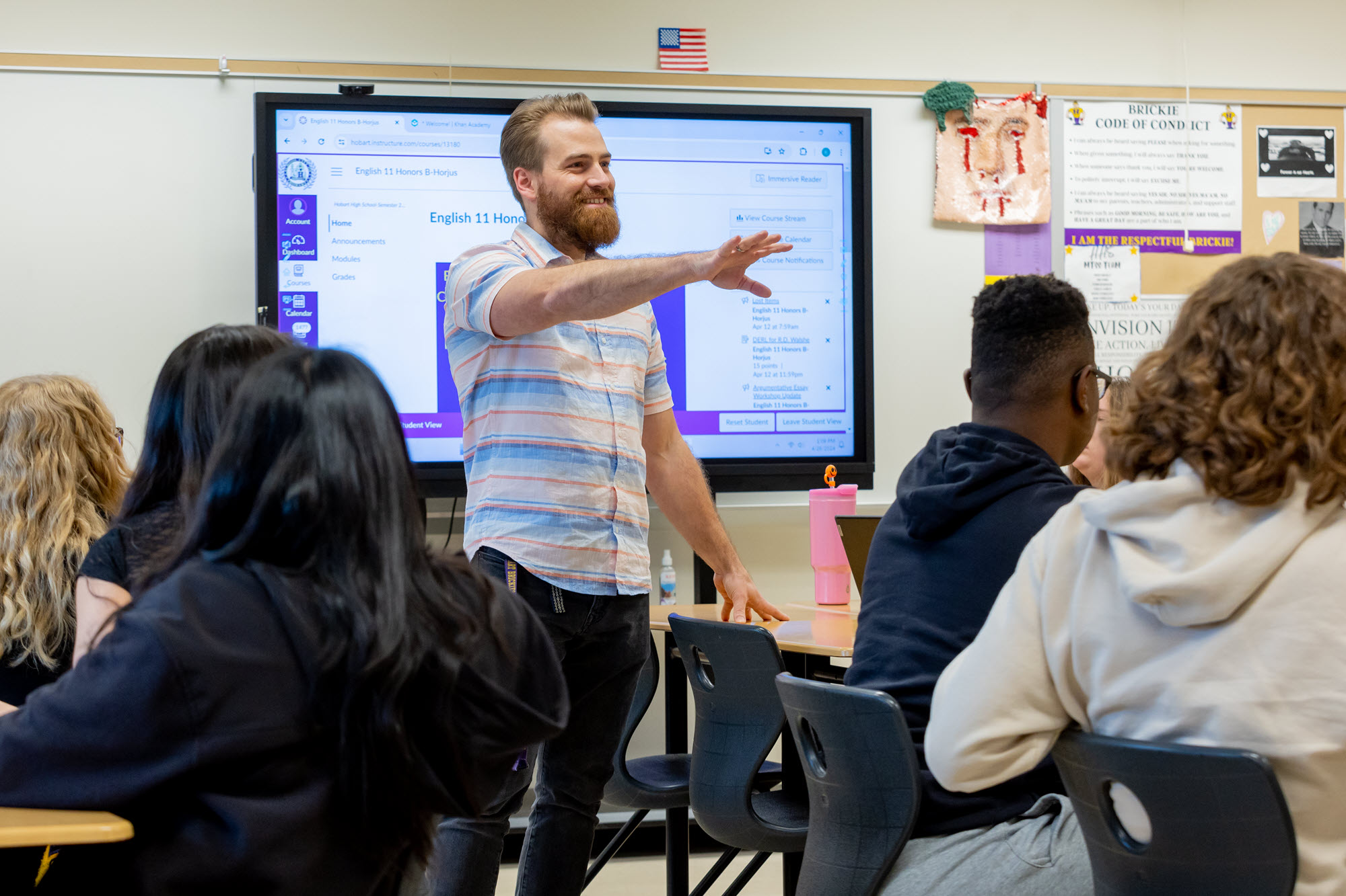 Picture of teacher, Ben Horjus, standing in front of a class of students.