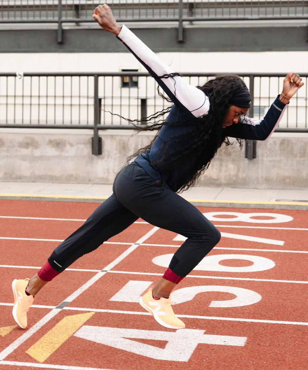 Woman begins to run on a track