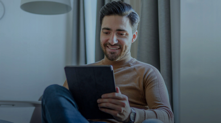 Caucasian Man Having Video Call and Using Digital Tablet at Home