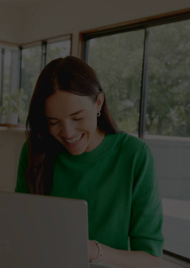 Image of a woman and laptop