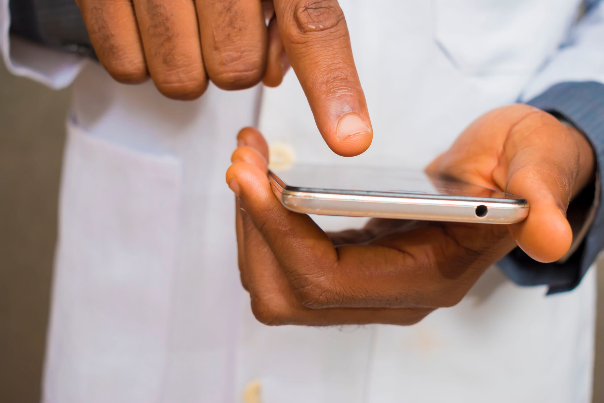 Health care worker using smartphone