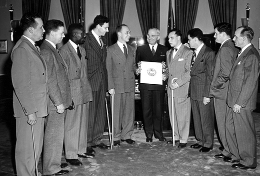 Included in the photograph from left to right are: Lloyd M. Greenwood, Executive Director, New York; Harrison King, Washington, D.C.; James W. Hope, Gastonia, N.C.; Raymond T. Frey, Past President, Le Banon, Pennsylvania; Byrum S. Shumway, of Board of Directors, Baltimore, Maryland; President Harry S. Truman; Irvin P. Schloss, Baltimore, Maryland; Robert Pistel, Chairman, Baltimore, Maryland, Group; Peter J. McKenna, Jr., Washington, D.C.; and John F. Brady, President, New York City.