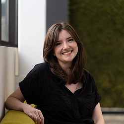 A woman smiling at the camera.