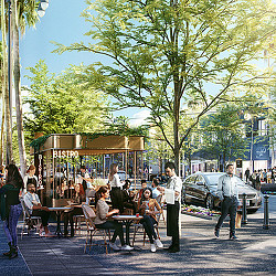 A group of people sitting at tables.