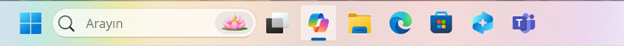 Copilot simgesinin seçili olduğu Windows görev çubuğunun ekran görüntüsü.