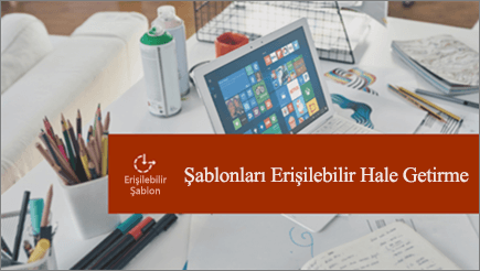 Üzerinde dizüstü bilgisayar ve dağınık kağıtlar bulunan bir ofis masası