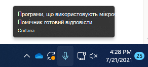 Знімок екрана: піктограма мікрофона на панелі завдань.