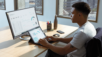 A man using Surface with external monitor