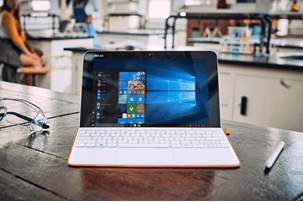 A laptop on a desk in a science lab