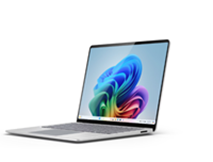 Surface Laptop (7. edycja) skierowany w lewo z kwiatem na ekranie.